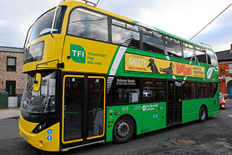 Image of bus with advertisement on the side